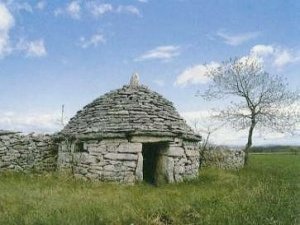 The kažun, a small stone house in the Istrian landscape.
